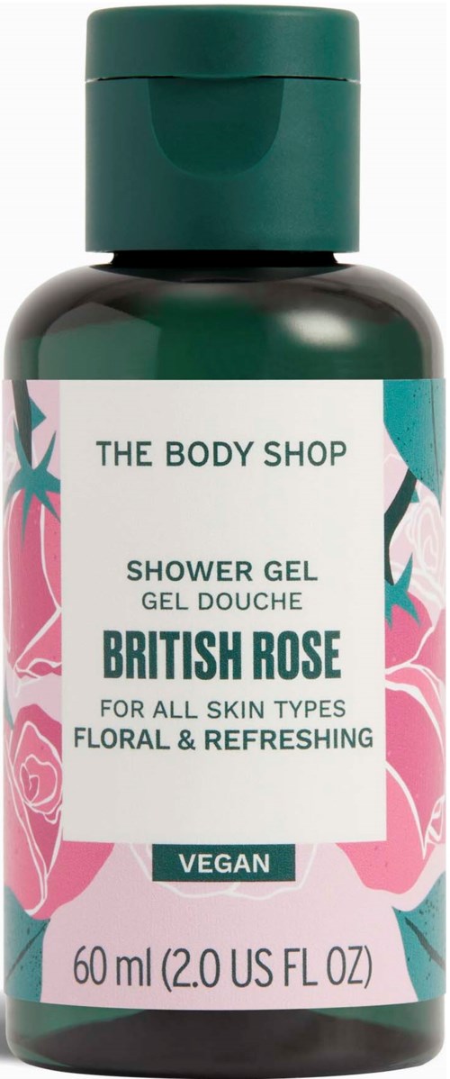 Eine Flasche Duschgel mit rosa Rosen und grünen Blättern auf dem Etikett, Text zeigt, es ist vegan und blumig.
