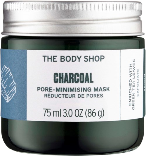 Grüner Glasbehälter mit silbernem Deckel, gekennzeichnet als The Body Shop Charcoal Pore-Minimising Mask, 75 ml.