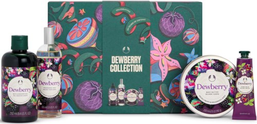 Dewberry-ihonhoitotuotteiden kokoelma, joissa on violetteja ja marjateemaisia etikettejä, pakkauksessa.