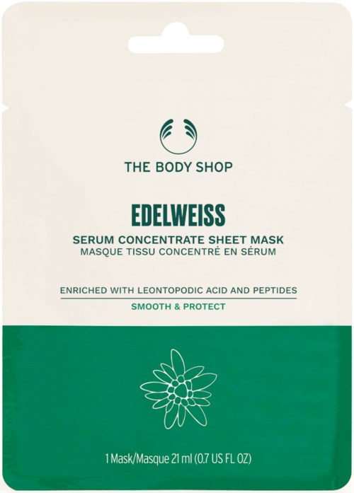 Eine Gesichtsmaske von The Body Shop, namens Edelweiss, mit grünen Akzenten und einer Blumenzeichnung.