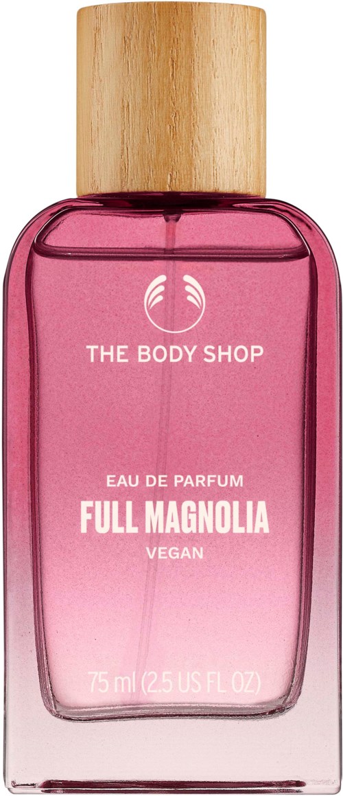 Rosa Parfümflasche mit Holzdeckel, beschriftet 'The Body Shop,' 'Full Magnolia,' 'Vegan' und enthält 75 ml.