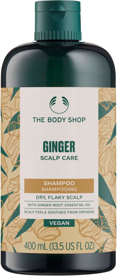 Eine 400 ml Flasche Ginger-Scalp Care Shampoo mit dunkelgrünem Deckel und dekorativer Etikett mit Blättern.