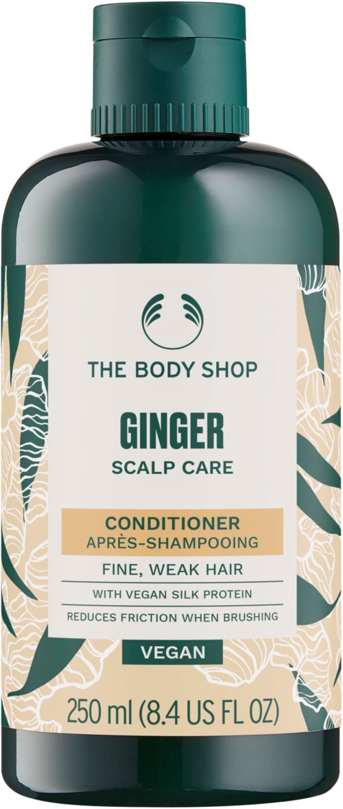 Eine Flasche Ginger Scalp Care Conditioner von The Body Shop, für feines, schwaches Haar. Vegan und gegen Frizz.