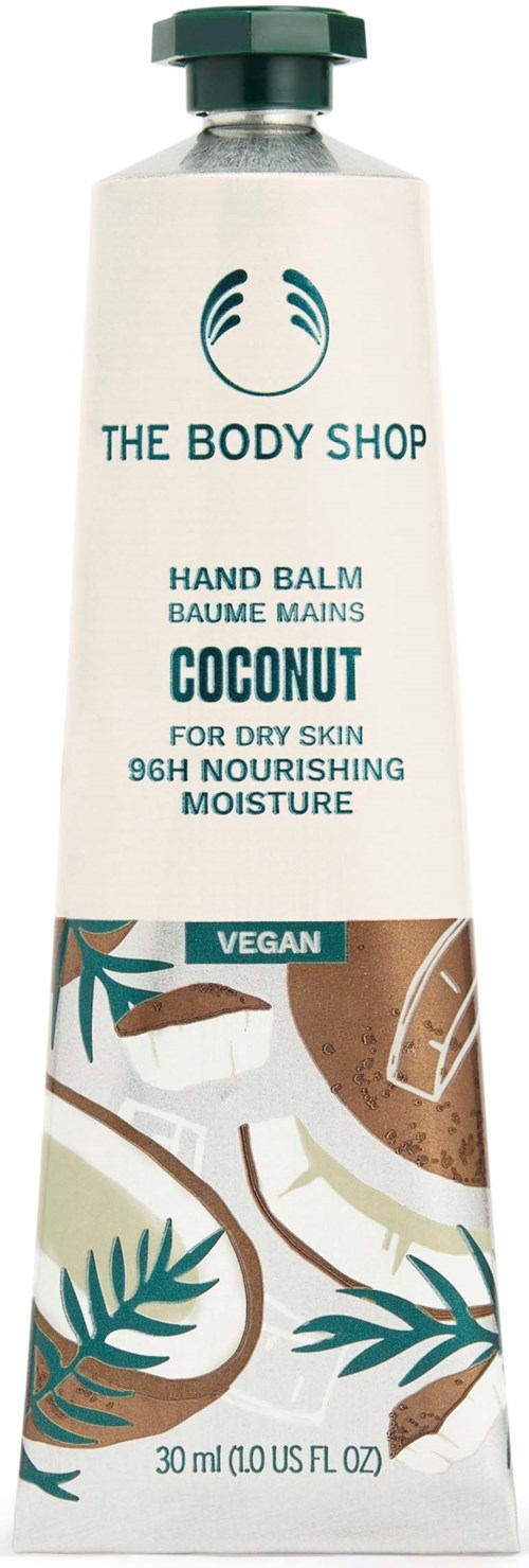 A tube of coconut scented hand balm from The Body Shop, vegan, for dry skin, 30 ml, with nature-themed design.