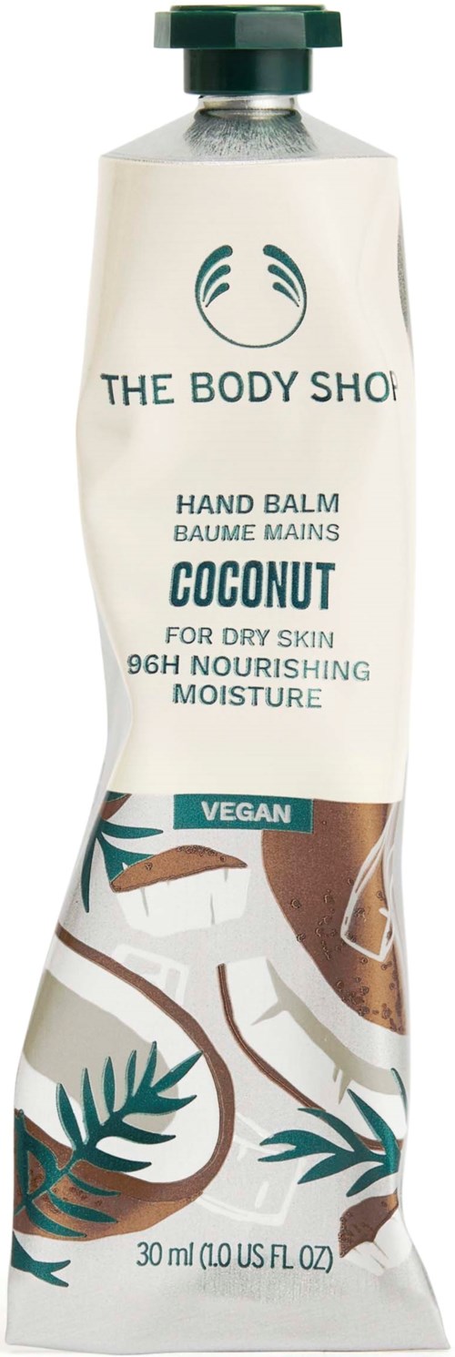 A coconut-scented hand balm in a crinkled tube, labeled vegan, for dry skin, offering nourishing moisture and featuring tropical leaf designs.
