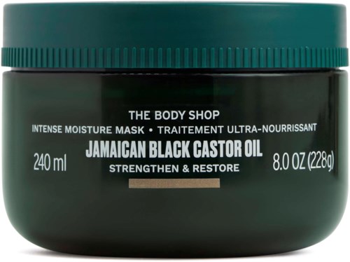 Ein grüner Behälter von The Body Shop mit Jamaican Black Castor Oil und grünem Deckel, für Haar und Haut.