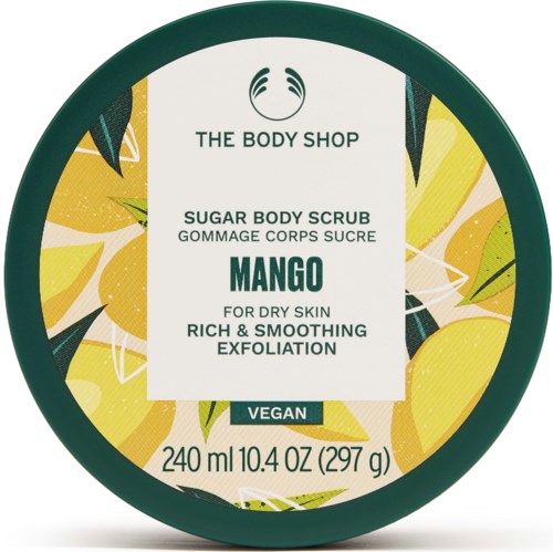 Ein grüner runder Behälter mit Mangosugar-Body-Scrub, vegan, für trockene Haut, gute Peelingwirkung.