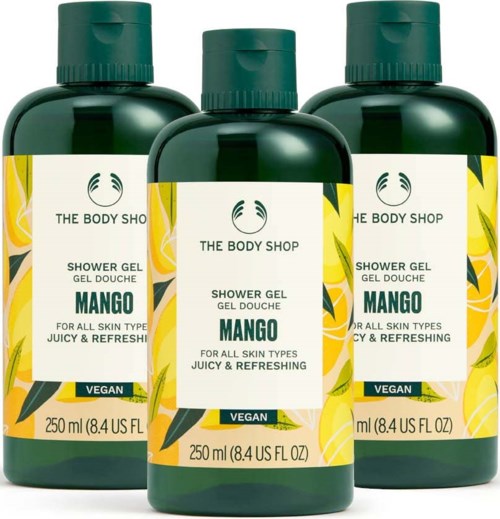 Drei Flaschen Mangoduf-Duschgel von The Body Shop, vegan markiert, je 250 ml, mit gelben Akzenten.