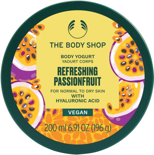 Ein runder gelber Deckel mit lila und orange Passionsfrucht-Illustrationen, grüner Text und Grünen Logo oben.