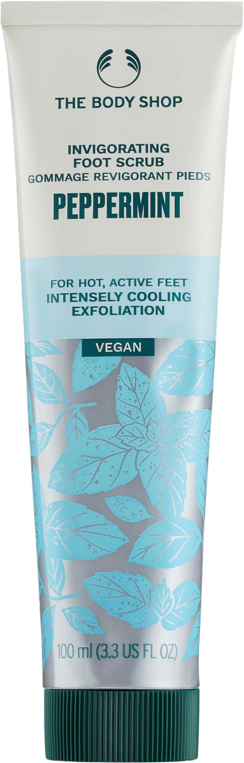 En tub med pepparmints fotskrubb från The Body Shop för svalkande, exfolierande och vegansk. Innehåller 100 ml.