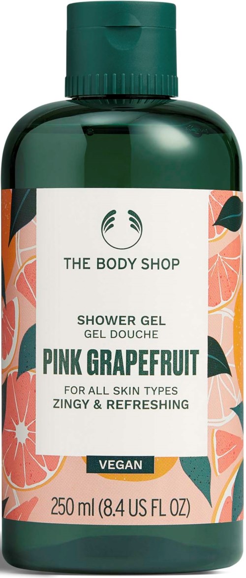 A green bottle of The Body Shop pink grapefruit shower gel with colorful grapefruit and leaf illustrations.