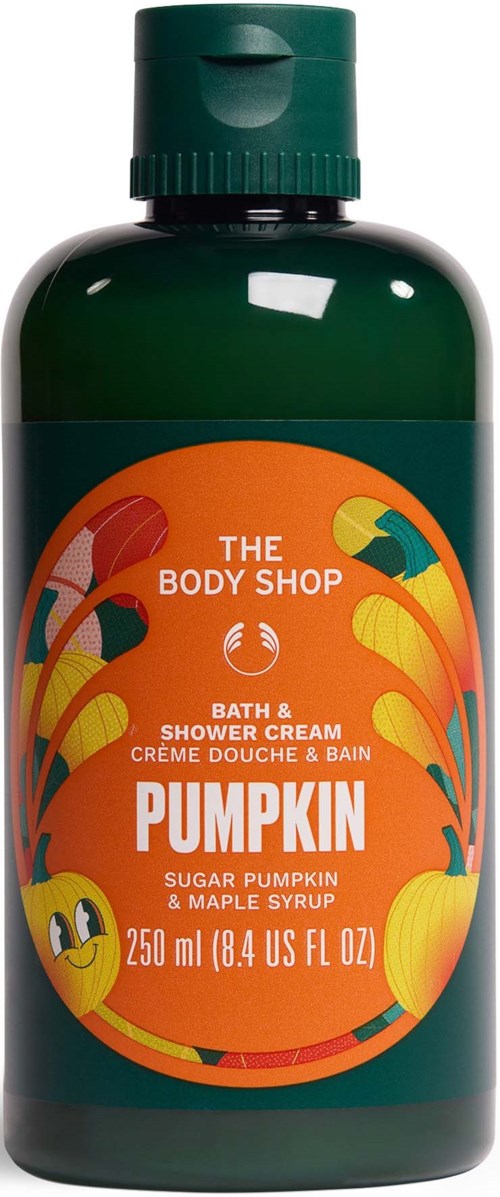 Green bottle of The Body Shop pumpkin bath and shower cream with orange and yellow pumpkin illustrations on the label.