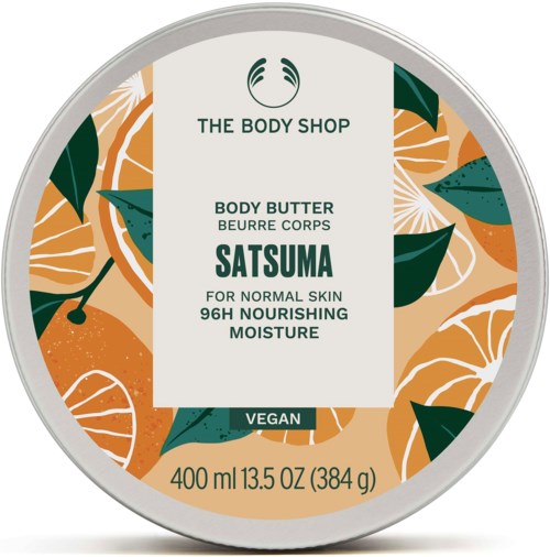 Body butter container with orange and green fruit peel design. Label shows brand The Body Shop, vegan, 400ml, nourishing.