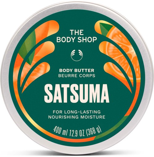 En rund beholder av The Body Shop Satsuma kroppssmør med oransje og grønn design og produktnavn i hvitt.