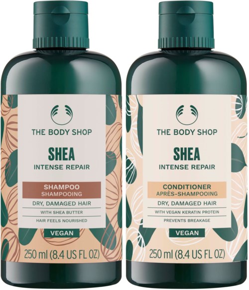 Zwei Flaschen Shea Intense Repair Shampoo und Conditioner für trockenes, geschädigtes Haar, vegan gekennzeichnet.