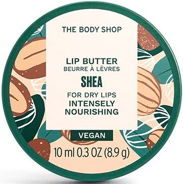 Runde Verpackung für Shea Lippenbalsam von The Body Shop, zeigt, dass es vegan ist und für trockene Lippen.