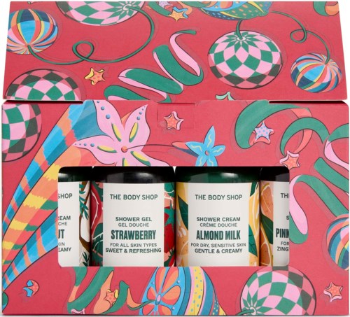 Värikästä lahjapakettia, jossa on kolme putkiloa kylpygeeliä ja voidetta The Body Shopista.