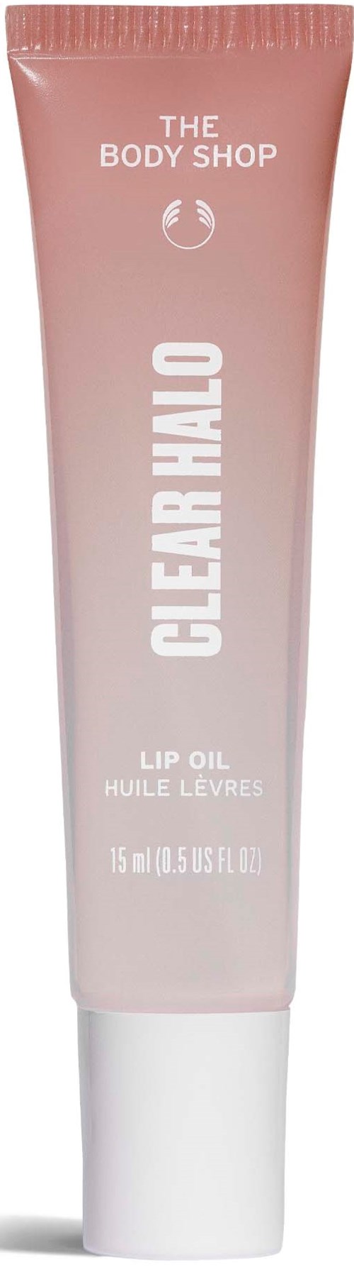 Ljusrosa tub med läppolja från The Body Shop som heter Clear Halo. Den innehåller 15 ml produkt.