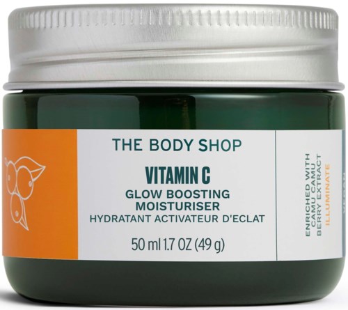 Grüner Cremetopf mit Vitamin C-Glanz-Boosting-Feuchtigkeitscreme, orange-weiße Etikette von The Body Shop.