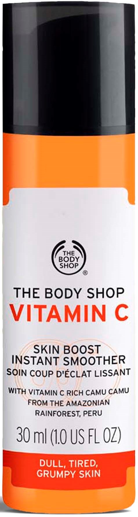 En vit och orange flaska med The Body Shop Vitamin C hudförstärkare för trött, grumpy hud från Peru.