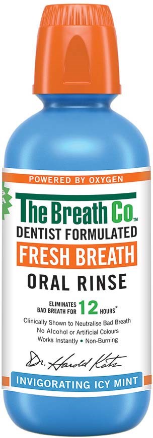Blue bottle with orange cap, labeled as fresh mint oral rinse from The Breath Co., mint flavor, kills bad breath for 12 hours.