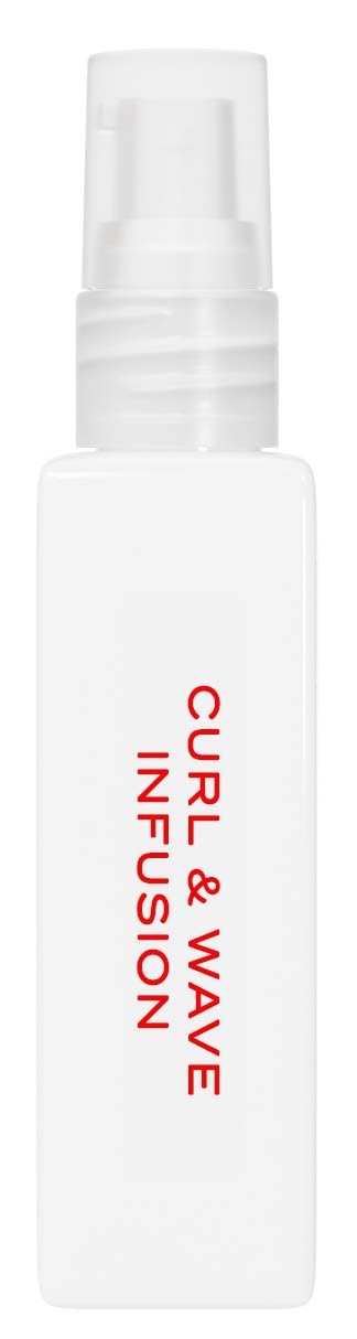 A white spray bottle with red text that says "CURL & WAVE INFUSION."