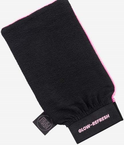 A black, soft, rectangular cloth with a brand tag, used for cleaning or refreshing the face or skin.