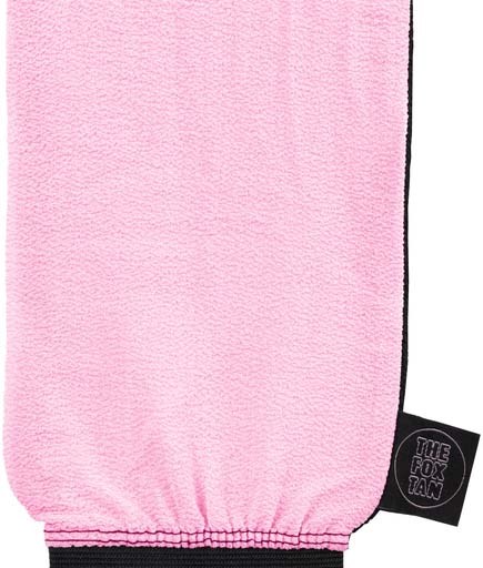 A pink, soft fabric with an elastic band at the bottom and a black label that reads 'THE FOX TAIL.'