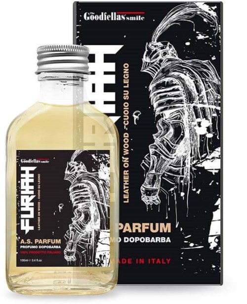 A perfume bottle with a black label featuring a white skeleton illustration and bold white text. The bottle and box display Italian origin.
