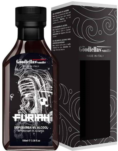 Eine dunkelbraune Flasche mit schwarzem Deckel, Etikett zeigt ein stilisiertes Gesicht und den Text "The Goodfellas Smile."