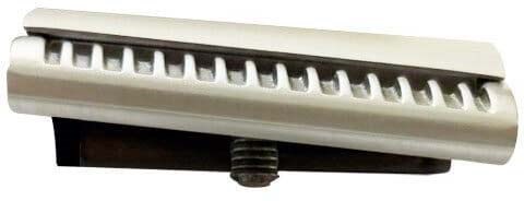 A beige metal blade with teeth, mounted on a black base, used to cut or shave materials.