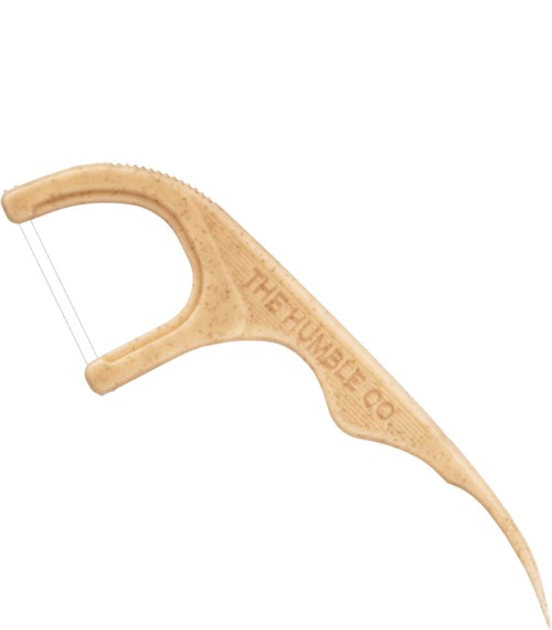 A beige, plastic, hooked tool with the words "THE THUMBER.COM" printed on it.