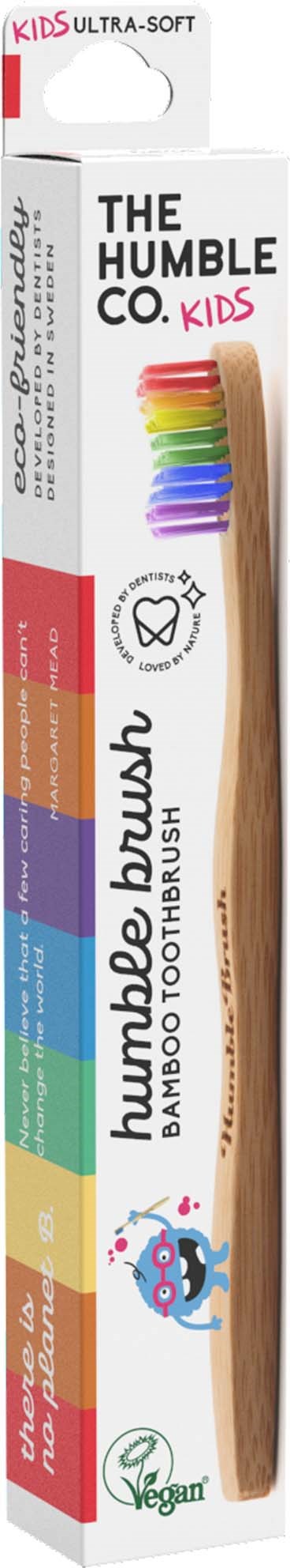 A bamboo toothbrush with colorful bristles, packaging labeled for kids, soft bristles, and eco-friendly Vegan mark.