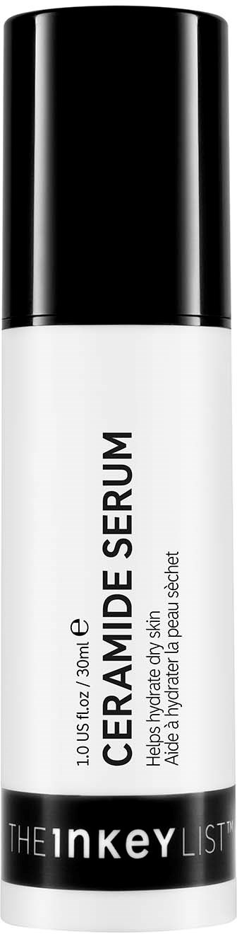 Een witte fles met een zwarte dop, gemarkeerd 'Ceramide Serum' voor huidverzorging van The Inkey List.