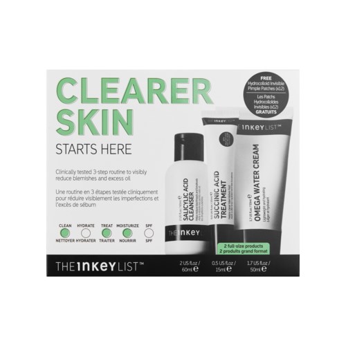 Skincare products for oily skin, including cleanser, toner, moisturizer, and water cream, with green and white packaging.