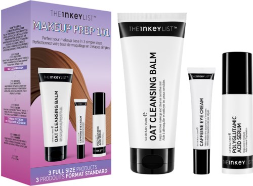 Box with skincare products, including cleansing balm, eye cream, and serum, displayed with some tubes outside the box.