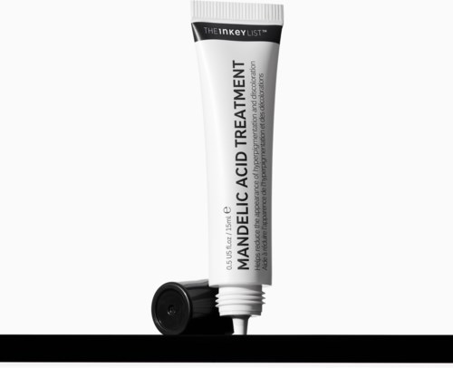 Een tube mandeliczuurbehandeling voor de huid, met een zwarte dop, witte body en zwarte tekst.