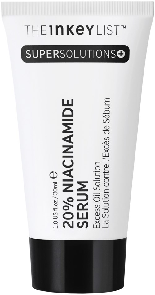 A tube of skincare product with 20% niacinamide serum, labeled as a solution for excess sebum and skin concerns.