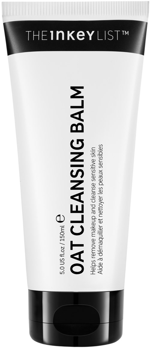 Een witte tube met 'Oat Cleansing Balm' en een zwart-wit dop, voor huidverzorging.