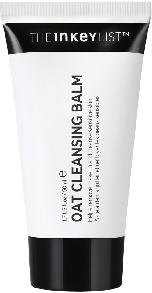 Eine weiße Tube mit schwarzem Deckel, gekennzeichnet als OAT CLEANSING BALM, für die Hautreinigung.