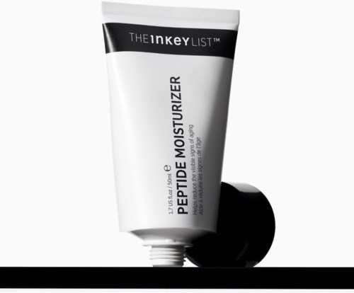 Witte tube met Peptide Moisturizer van THE INKEY LIST en een zwart-wit deksel.