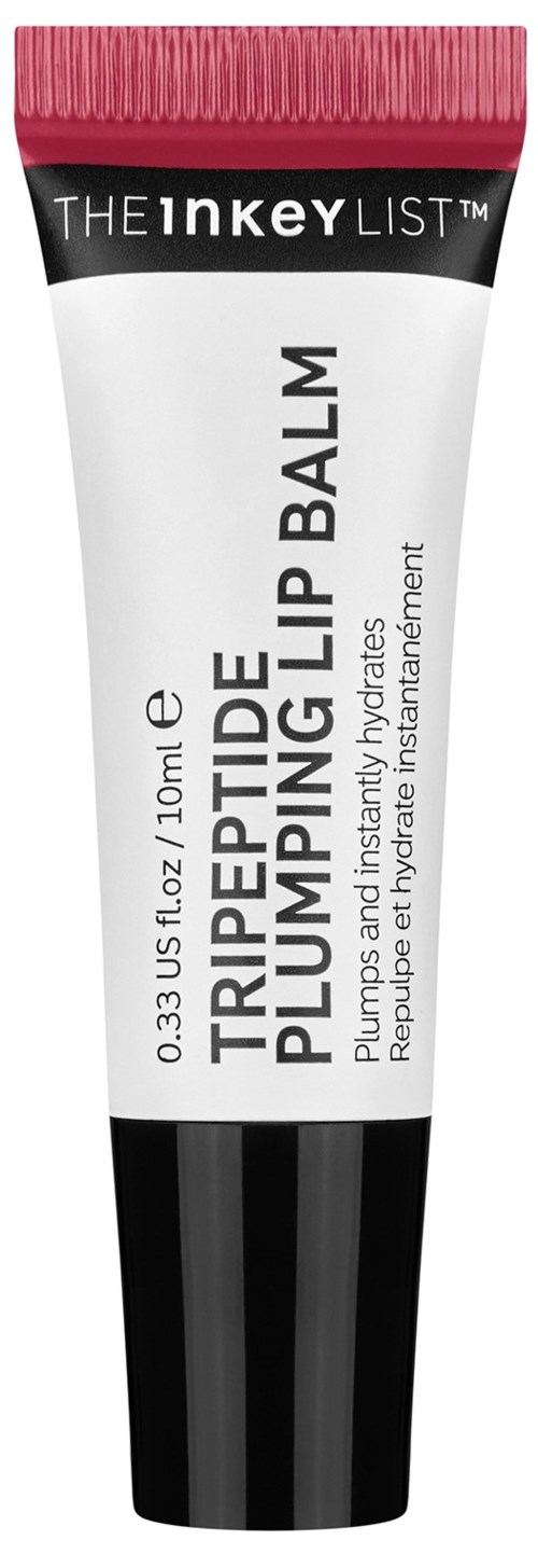 En tub med läppbalsam med svart och vitt design och rosa lock, märkt som tre gånger lip balm för läppar.