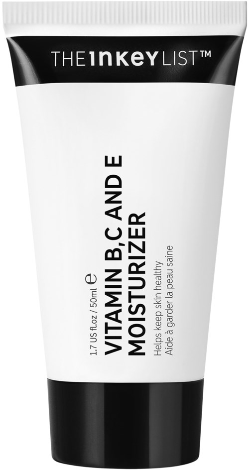 Een witte tube met zwarte bovenkant, gelabeld als vitamine B, C en E moisturizer voor de huidgezondheid.