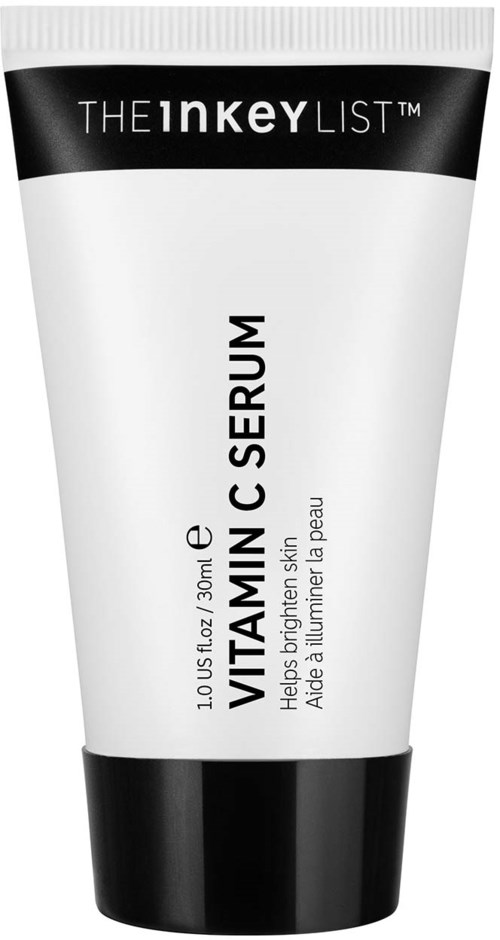 Een witte tube met zwarte dop en zwarte bovenetiket, promotie van vitamine C-serum voor stralende huid.