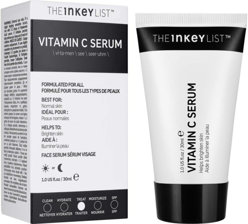 Een doos en tube met vitamine C-serum voor het gezicht, beweren de huid te verhelderen en geschikt voor normale huid.