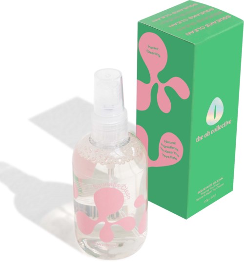 A clear spray bottle with pink octopus designs and a green box labeled 'the oh! collective' is shown.