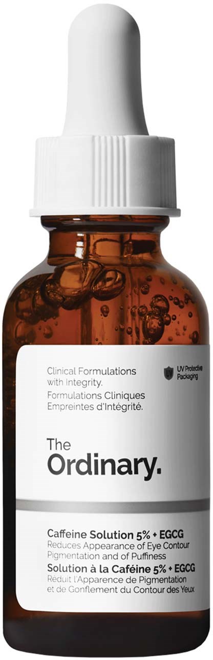 Een klein bruine fles met witte pipetdop, gelabeld als The Ordinary cafeïne-oplossing 5% plus EGCG.