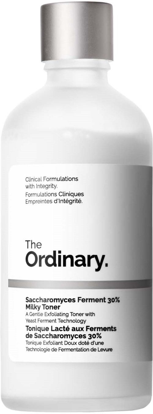 A white bottle with a silver cap contains The Ordinary Saccharomyces Ferment 30% Milky Toner.
