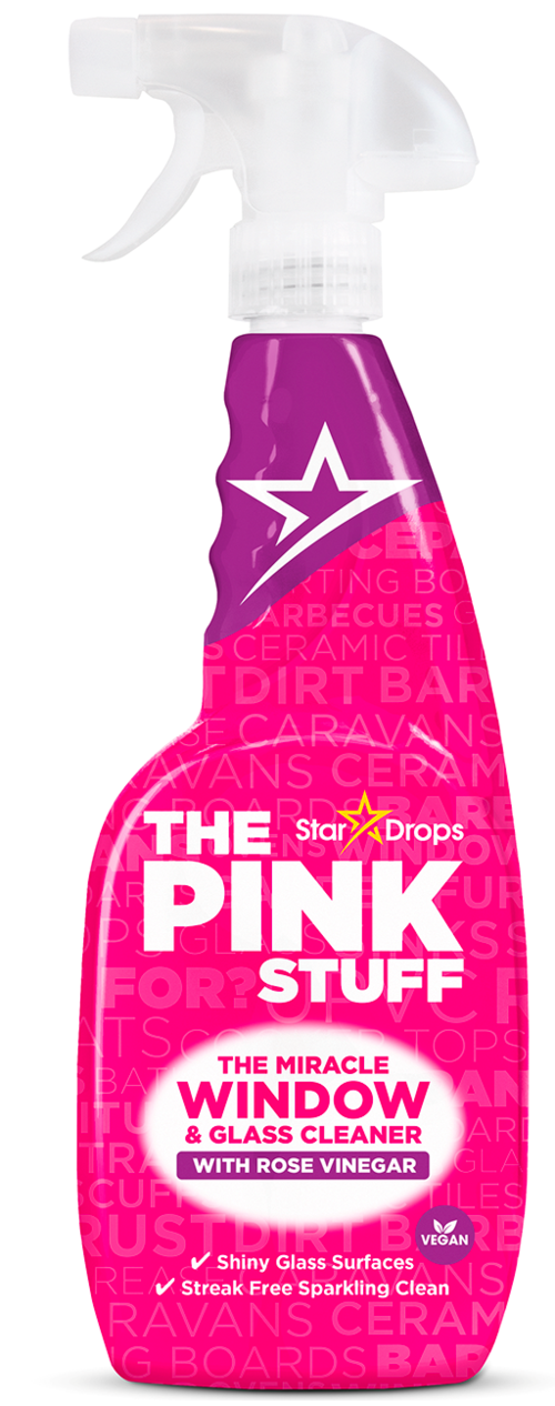 A pink spray bottle labeled as window and glass cleaner with rose vinegar, stars and cleaning features.