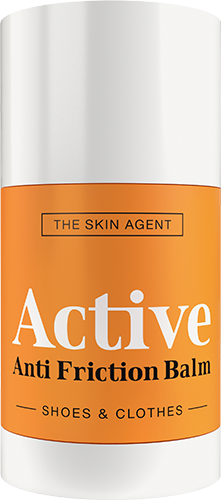 En orange cylindrisk behållare med vit lock, märkt "Active Anti Friction Balm" för skor och kläder.
